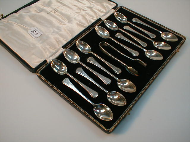 Appraisal: A cased set of twelve Art Deco silver teaspoons and