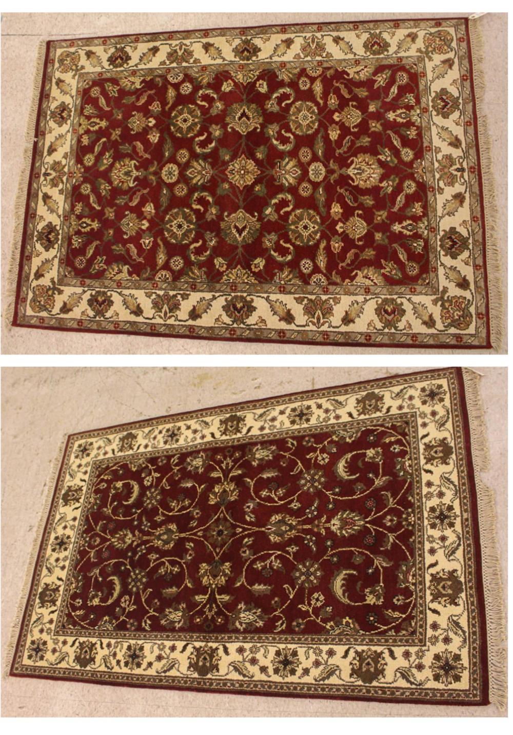 Appraisal: TWO SIMILAR HAND KNOTTED ORIENTAL AREA RUGS Indo-Persians scrolling floral