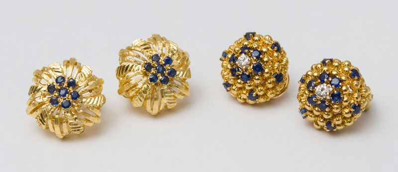 Appraisal: TWO PAIRS OF K GOLD AND SAPPHIRE EARCLIPS Pebbled domes