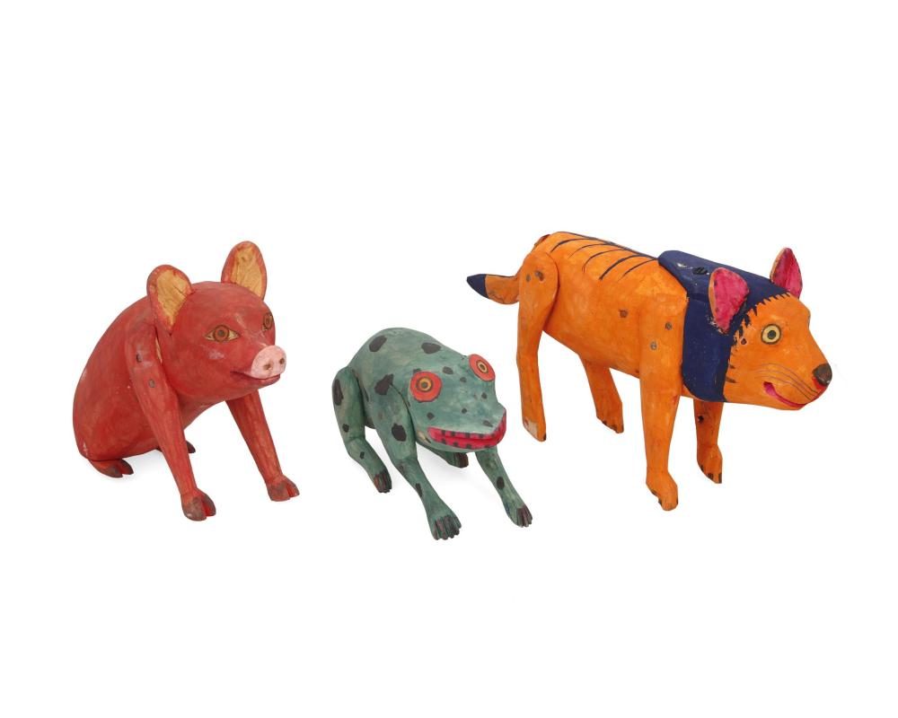 Appraisal: A group of Manuel Jimenez Ramirez carved wood animals Manuel