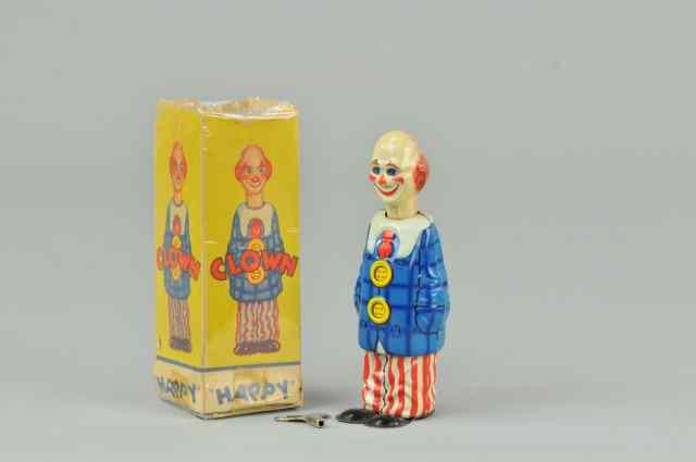 Appraisal: HAPPY CLOWN Distler Germany boxed example lithographed tin clockwork driven