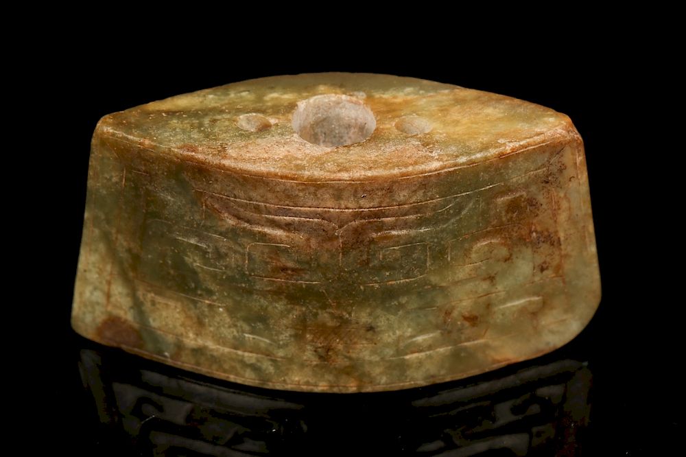 Appraisal: EARLY JADE SWORD FITTING SHAPE The jade appears in dark