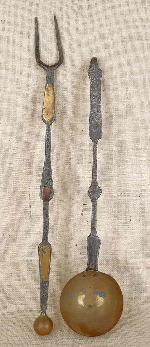 Appraisal: Pair of Pennsylvania brass inlaid wrought iron utensils the dipper