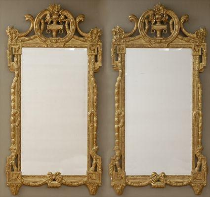 Appraisal: PAIR OF LOUIS XVI-STYLE CARVED GILTWOOD MIRRORS Each beveled plate