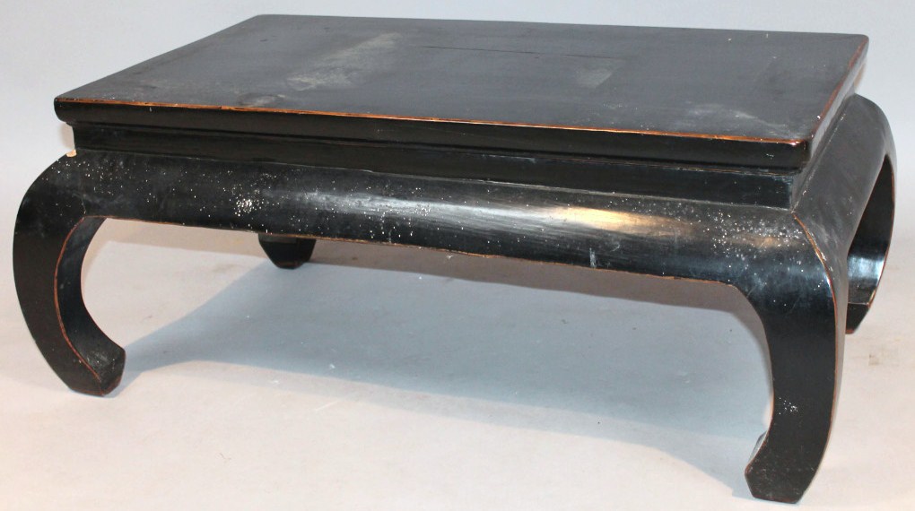 Appraisal: A Chinese black lacquer coffee table the rectangular top with