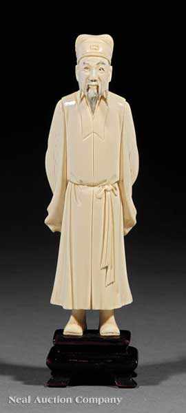 Appraisal: A Chinese Ivory Figure of a Scholar the bearded male