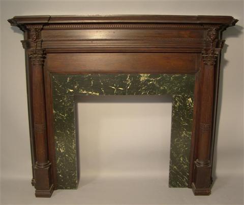 Appraisal: CLASSICAL STYLE CARVED MAHOGANY MANTLE The molded top above dentil