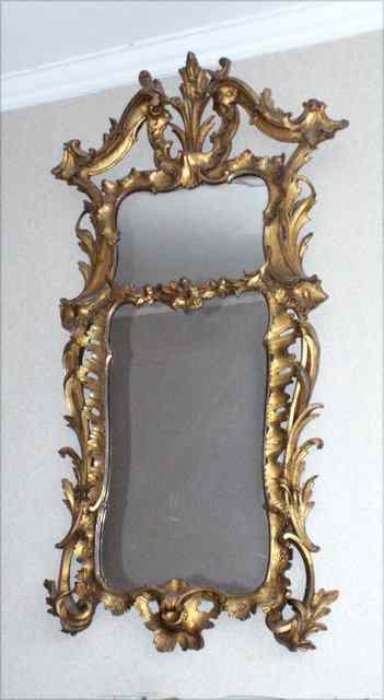 Appraisal: AN TH CENTURY GILTWOOD MIRROR of cartouche form all over