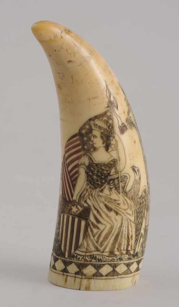 Appraisal: AMERICAN SCRIMSHAW CARVED WHALE'S TOOTH The one side with seated