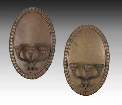 Appraisal: A Pair of Cast Bronze Deco Wall Sconces Three-arm sconces