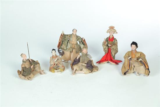 Appraisal: SIX CARVED AND PAINTED DOLLS China late th-early th century