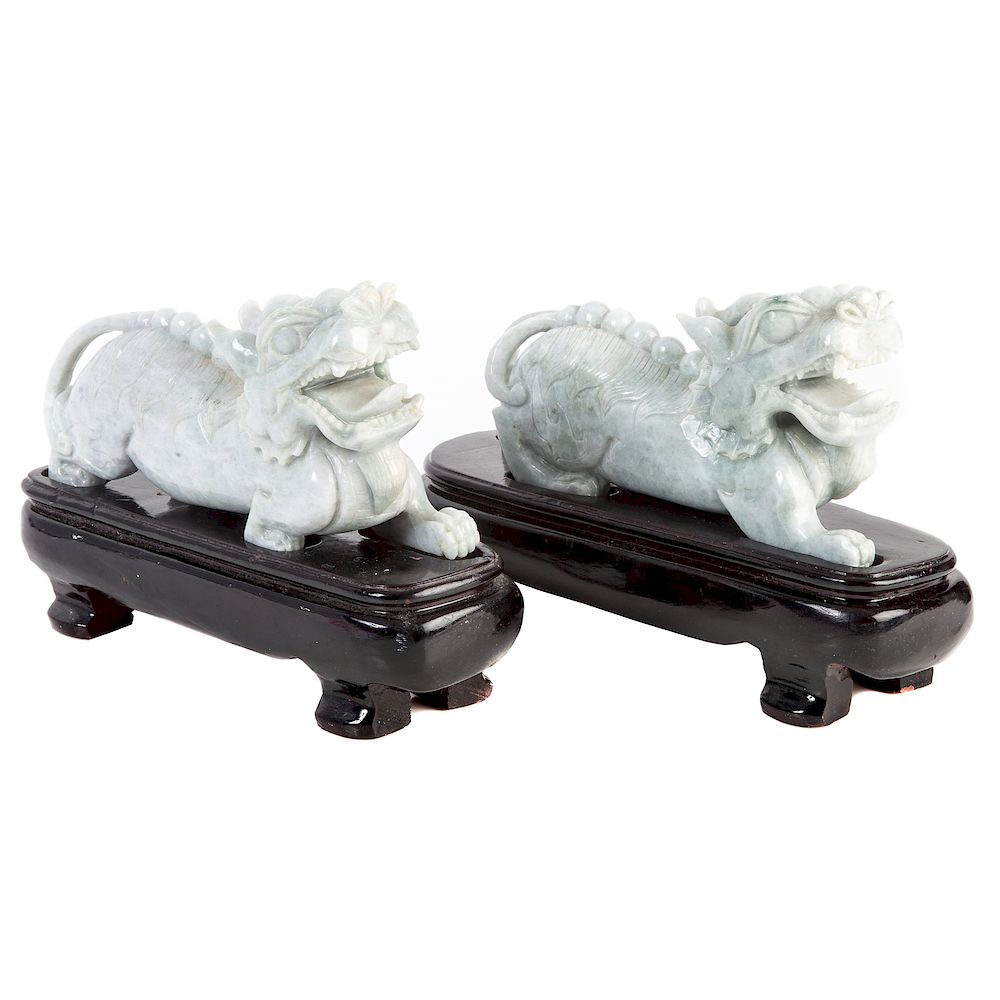 Appraisal: Pair Chinese Carved Jade Dragons each with fitted wood stand