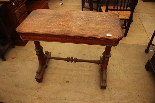 Appraisal: A VICTORIAN OAK FOLD OVER CARD TABLE cm wide