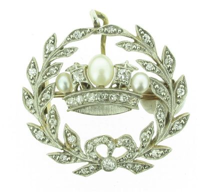 Appraisal: A Royal Navy brooch set with three oval shaped pearls