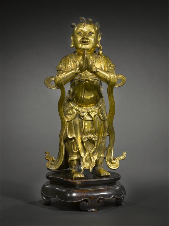 Appraisal: A fine Chinese gilt bronze model of a Buddhist acolyte