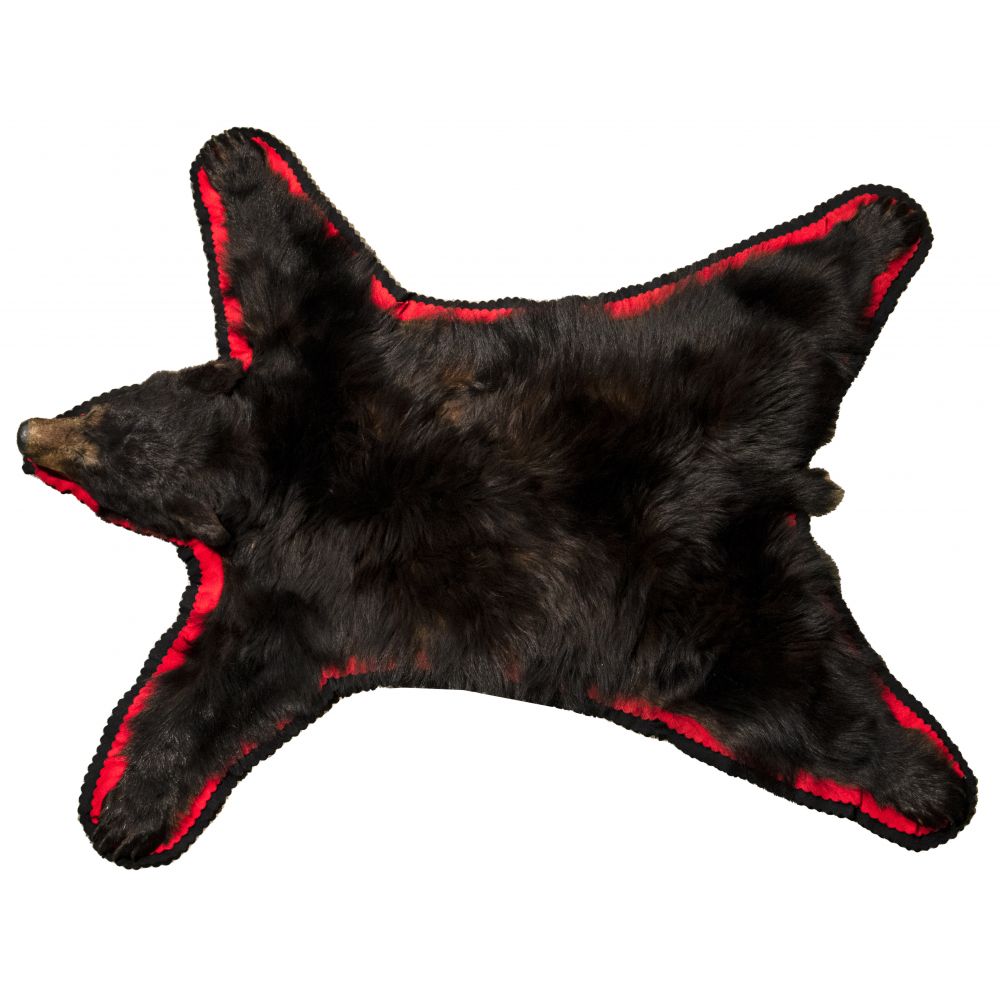 Appraisal: BLACK BEAR RUGBear skin having red and black felt scallop-edge