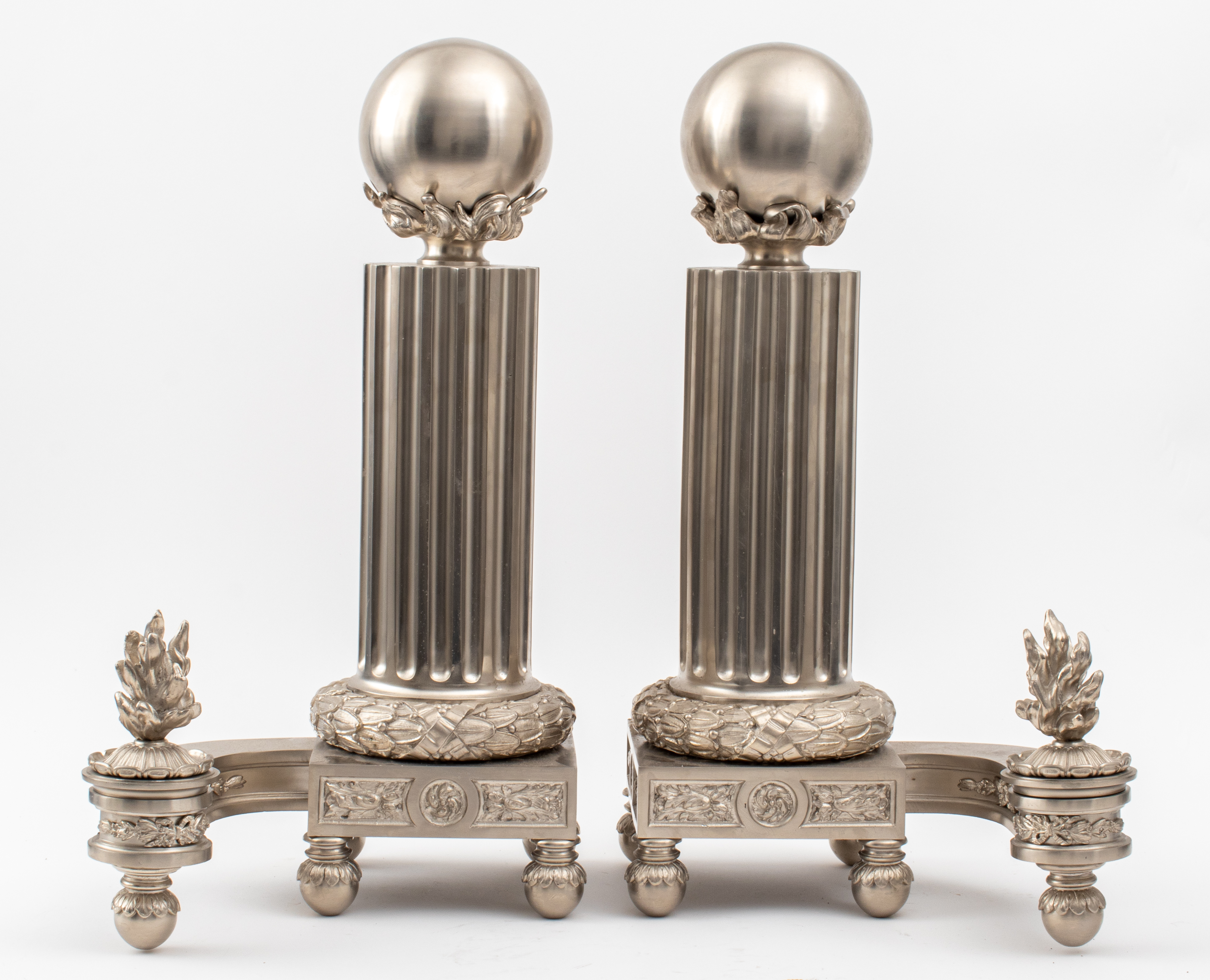 Appraisal: LARGE LOUIS XVI STYLE SILVER-TONED ANDIRONS PR Pair of large