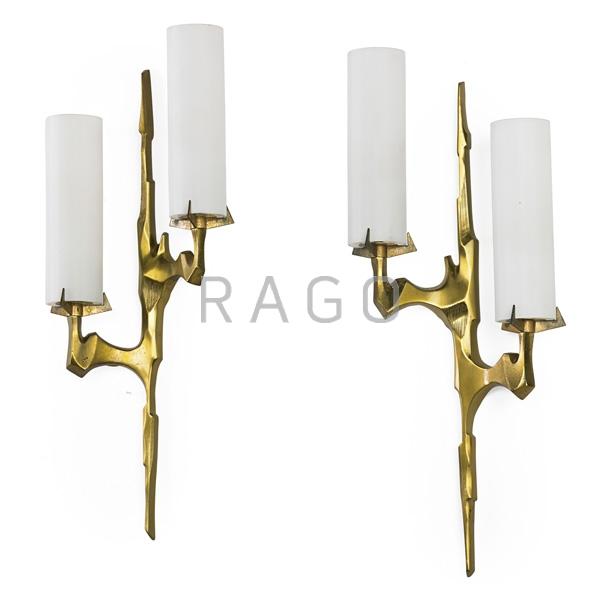 Appraisal: STYLE OF FELIX AGOSTINI Pair of sconces Condition Report Some