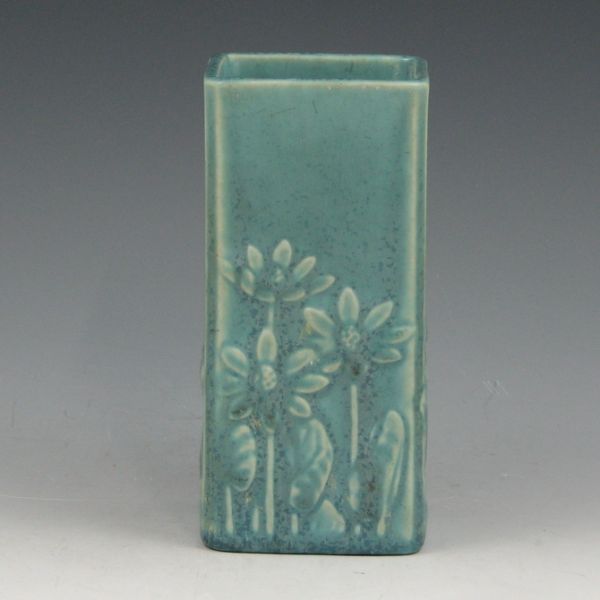 Appraisal: Rookwood vase from in matte blue with molded floral design