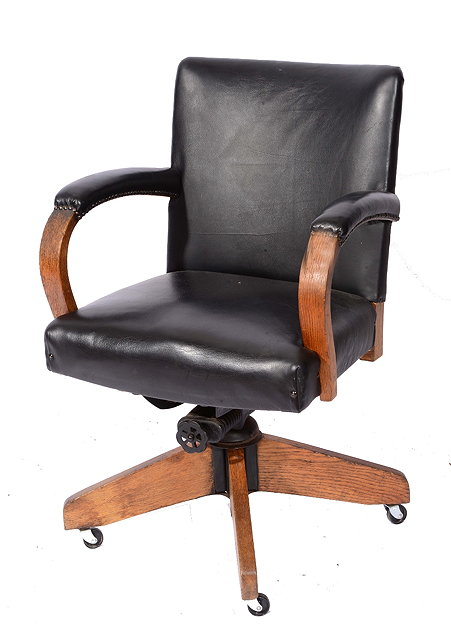 Appraisal: AN OAK FRAMED DESK CHAIR with swivel action and upholstered