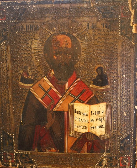 Appraisal: A th Century Russian Icon showing a saint holding a