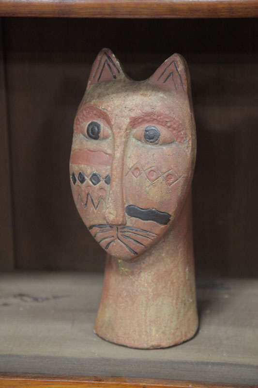 Appraisal: CAT BUST Pottery bust with geometric decoration on it's face