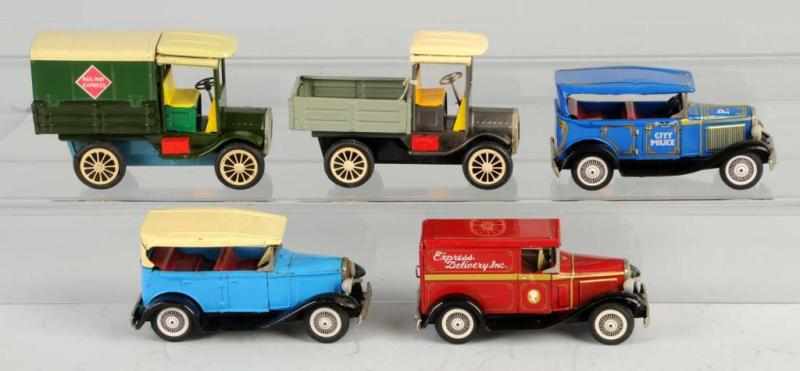 Appraisal: Lot of Tin Old-Timer Vehicle Friction Toys Description Japanese Working