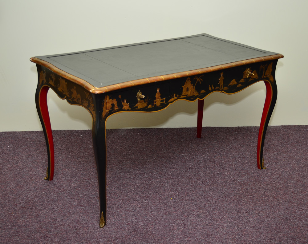 Appraisal: CHINOISERIE DECORATED BLACK LACQUER DESK Insert embossed leather top with