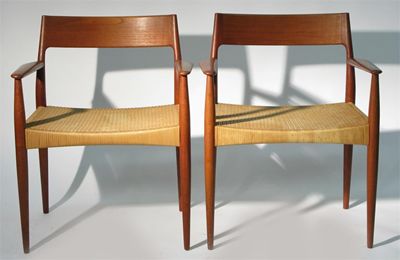 Appraisal: A pair of Danish Furniture Makers teak armchairs possibly designed