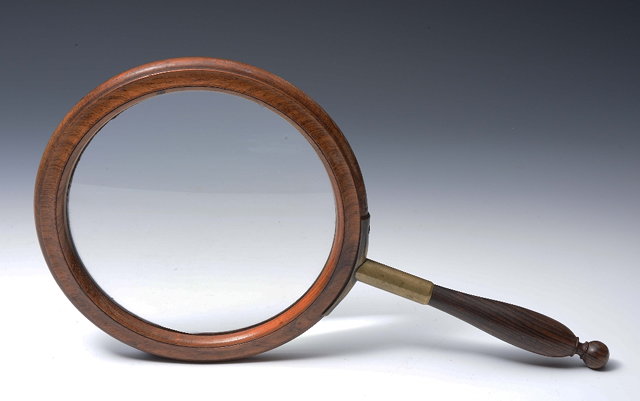 Appraisal: A TH CENTURY ROSEWOOD LIBRARY MAGNIFYING GLASS with chamfered edge