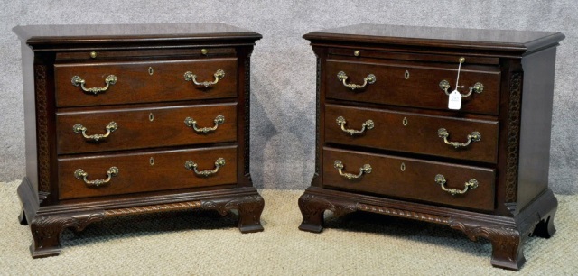 Appraisal: Pair of Half-Size Three-Drawer Bachelor ChestsChippendale style with ornate brasses