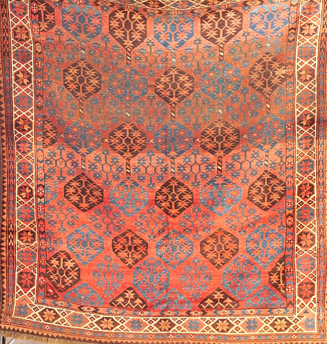 Appraisal: TURKOMAN Rug c with center panel of polygons and stars