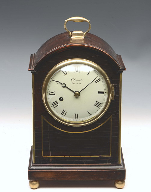 Appraisal: A REGENCY MAHOGANY MANTEL TIMEPIECE the white convex Roman dial