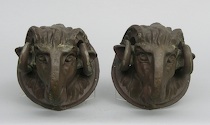 Appraisal: A Pair of Copper Molds of Ram's Heads A pair