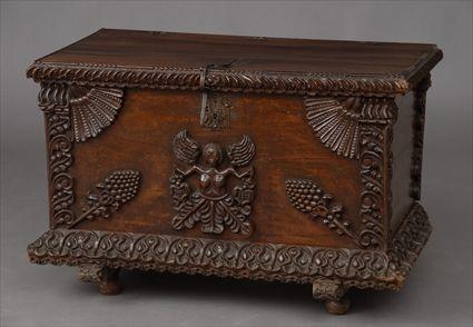 Appraisal: SOUTH AMERICAN CARVED CASSONE The hinged top with gadrooned edge