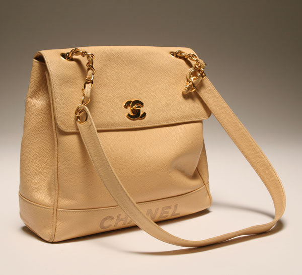 Appraisal: Chanel pebble leather ecru satchel bag with gold tone hardware