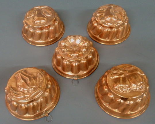 Appraisal: Five copper molds with galvanized interior th c h x