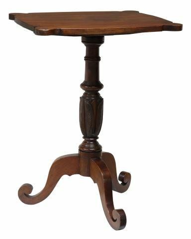 Appraisal: American mahogany tea table th c shaped tabletop turned center