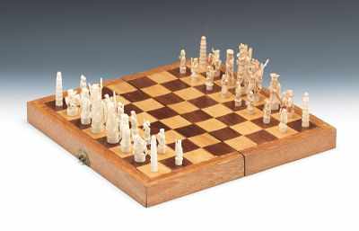 Appraisal: A Carved Ivory Chess Set A complete set of carved