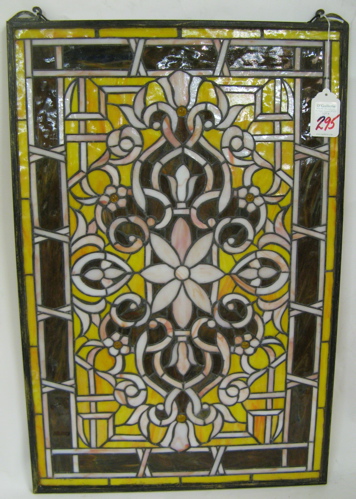 Appraisal: A STAINED AND LEADED GLASS WINDOW PANEL Yellow predominates with