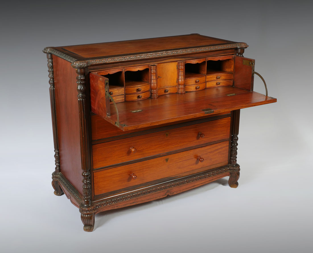 Appraisal: GENTLEMAN'S SECRETARY CHEST OF DRAWERS Cookie corner top with carved