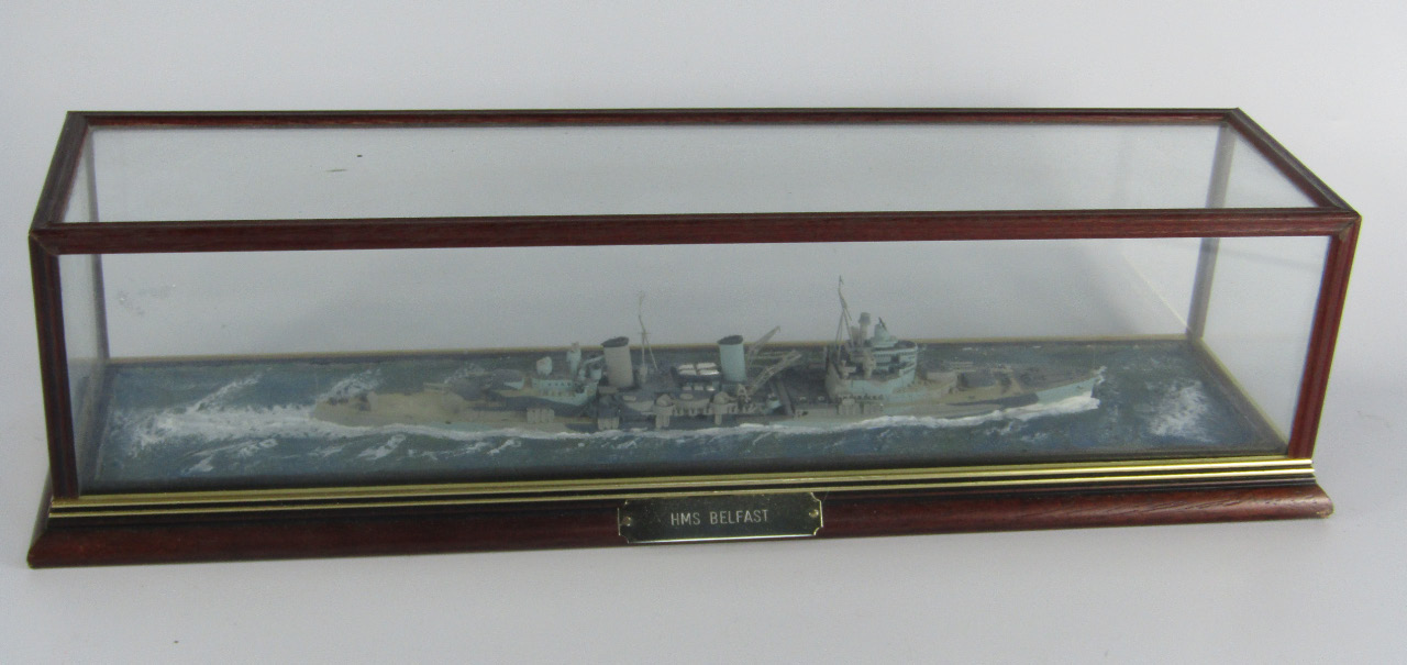 Appraisal: A scale model of the light cruiser HMS Belfast cased