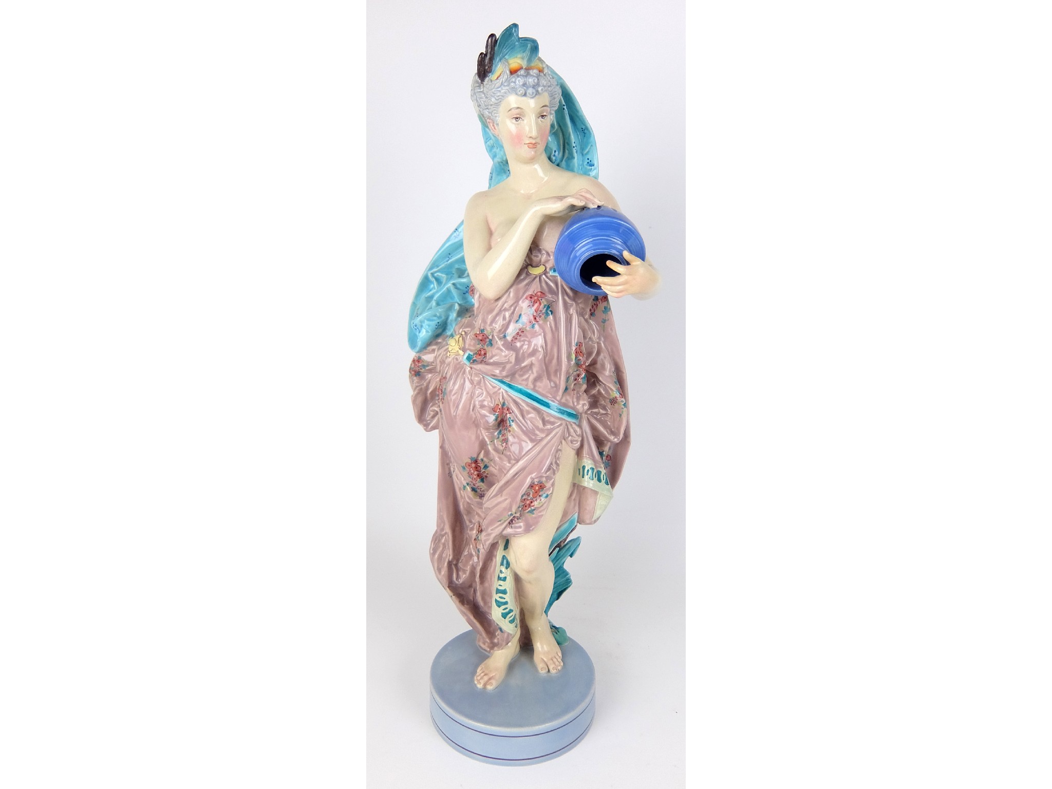 Appraisal: A Royal Worcester porcelain female figurestanding classically draped female holding