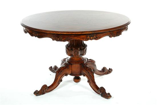 Appraisal: ROCOCO-STYLE CENTER TABLE England th century mahogany Scroll-carved skirt and