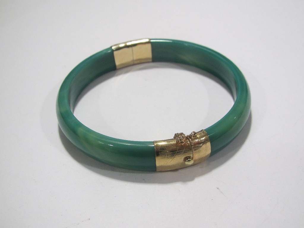 Appraisal: Jade bangle with ct gold plated mounts