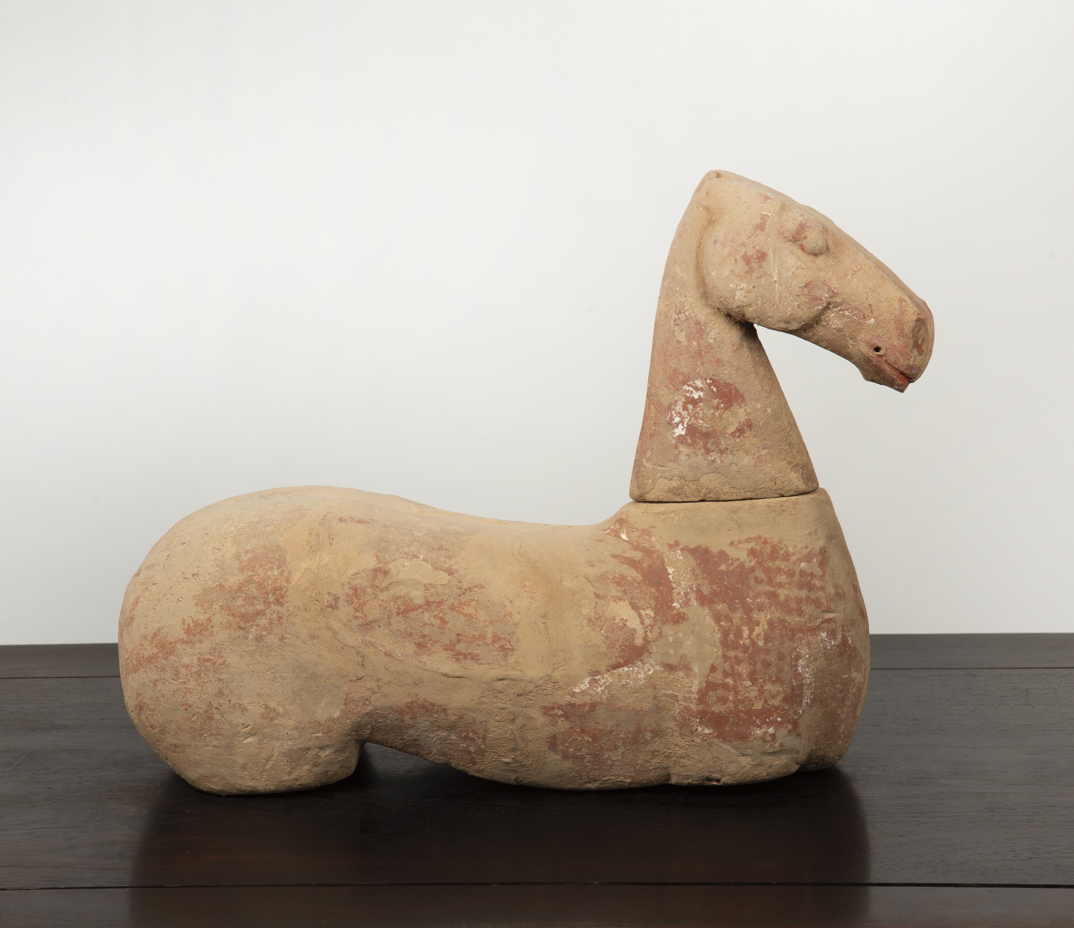 Appraisal: Large terracotta model horseChinese Tang or later the recumbent unglazed