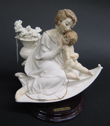 Appraisal: ITALIAN GIUSEPPE ARMANI PORCELAIN ART SCULPTURE Maternity of mother holding