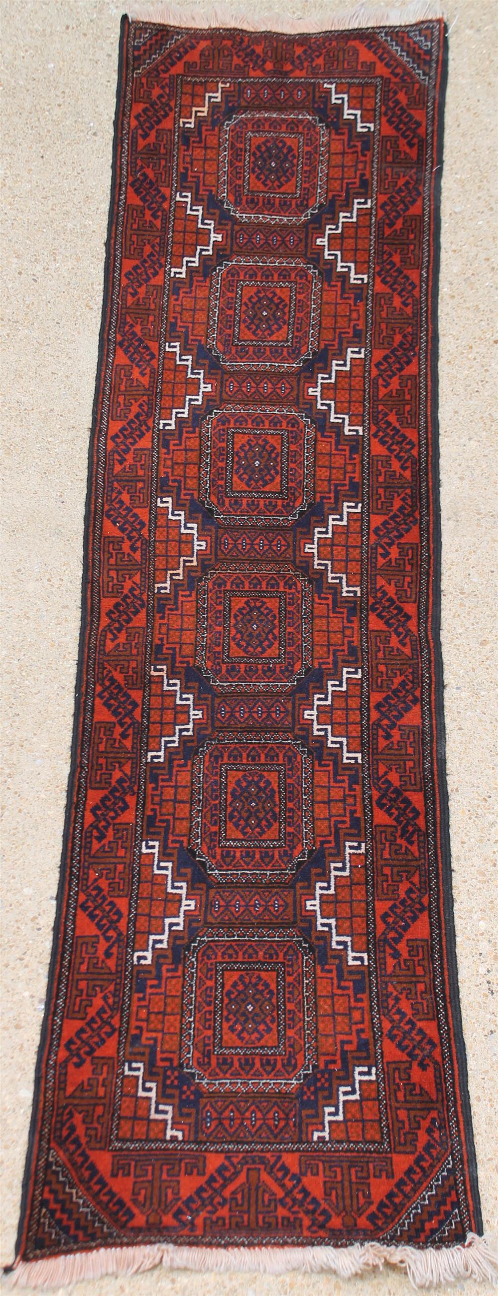 Appraisal: TRIBAL TURKMEN WOOL RUNNER design in black brown and off