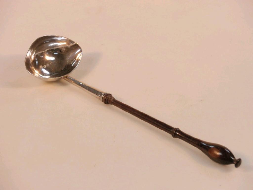 Appraisal: A George II silver Punch ladle by William Gwillim Peter