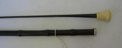 Appraisal: A BAMBOO SWORD STICK c with white metal collar turned